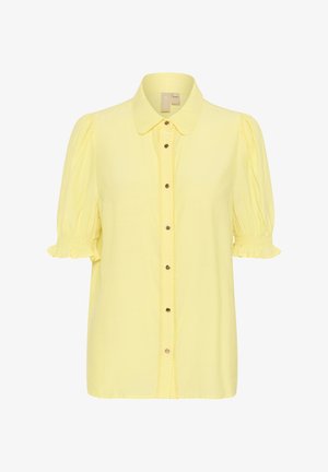 Żółta koszula z krótkim rękawem, z kołnierzykiem, z zapięciem na guziki i rozszerzanymi rękawami. Charakteryzuje się dekoracyjnym wykończeniem i gładką teksturą materiału.