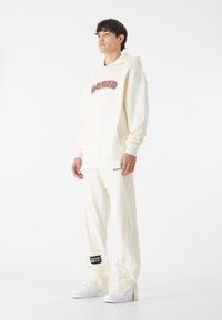 9N1M SENSE HERREN SENSE  - Joggebukse - whitesand