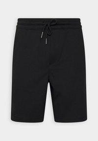 Pantaloni corti neri con coulisse in vita, dal design semplice, fronte piatto e vita elastica, mostrati su uno sfondo grigio chiaro uniforme.