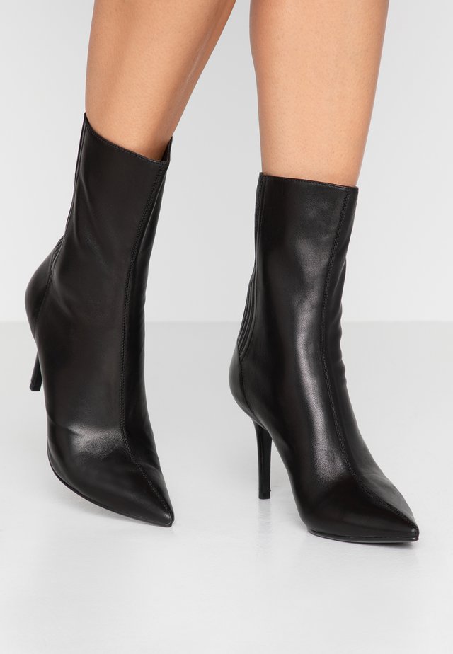High heeled ankle boots - black