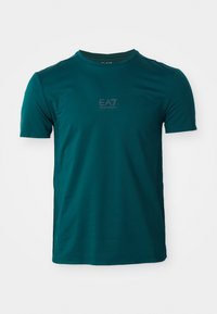 Teal short-sleeve T-shirt made of smooth fabric. Features a crew neck and a small EA7 logo in a darker shade on the front.