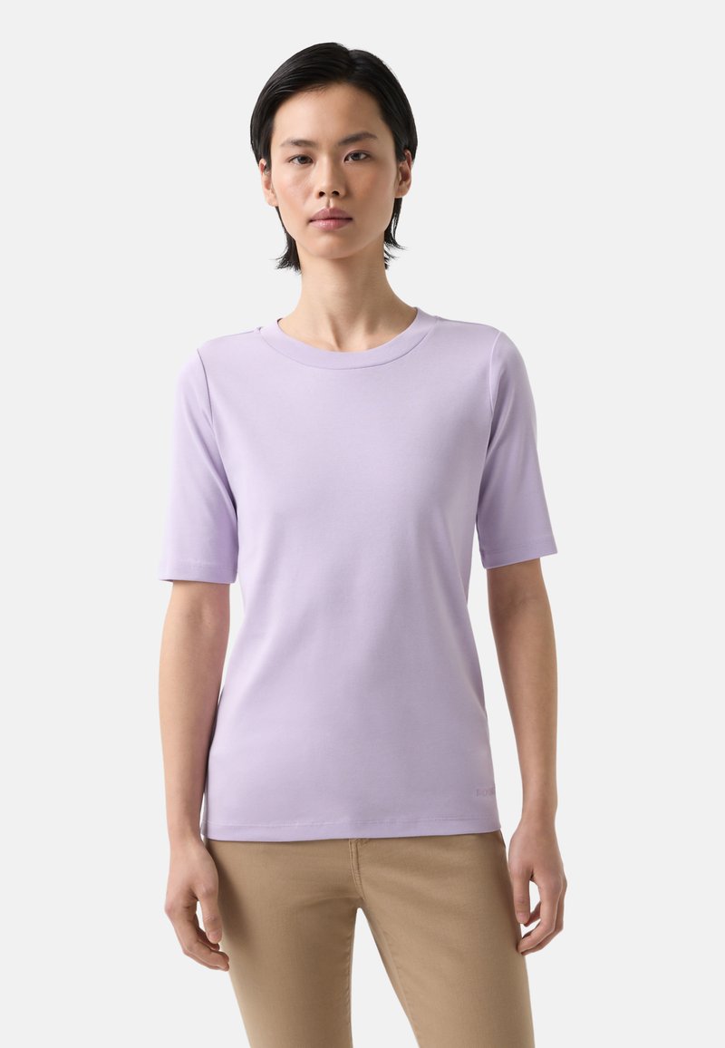 Lavender short-sleeve t-shirt with a crew neckline. Smooth texture, fitted design, and minimalistic branding on the lower hem.