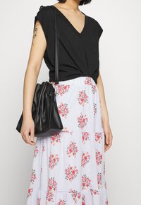 VILA Petite Maxi sukně - light blue