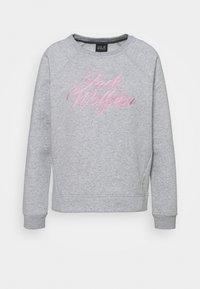 Felpa grigia con maniche raglan, con logo "Jack Wolfskin" ricamato in rosa al centro. Materiale morbido con polsini e orlo a coste.