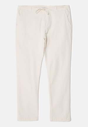 Ανοιχτό καφέ παντελόνι με υφή, ελαστική μέση και προσαρμόσιμο κορδόνι, διαθέτοντας δύο πλαϊνές τσέπες για αποθήκευση.