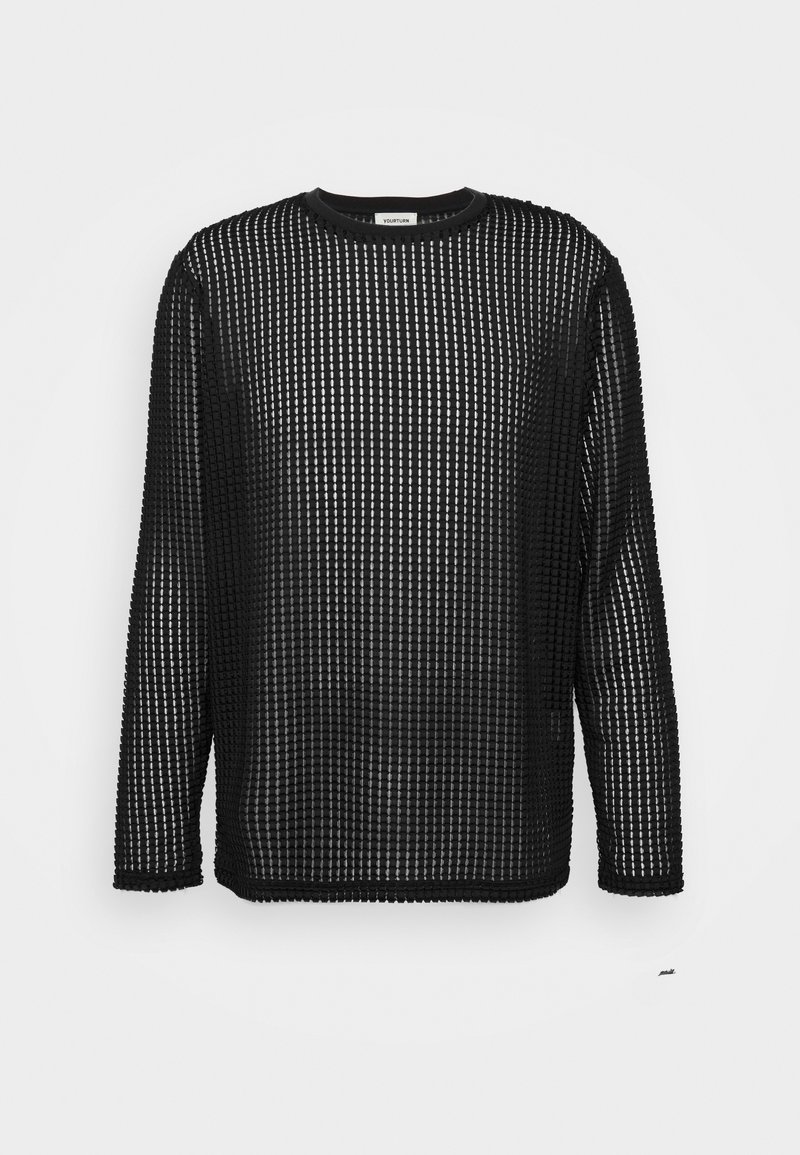 Svart långärmad topp med rutmönster, tillverkad av lätt och genomskinligt material. Rundad halsringning och rak nederkant.