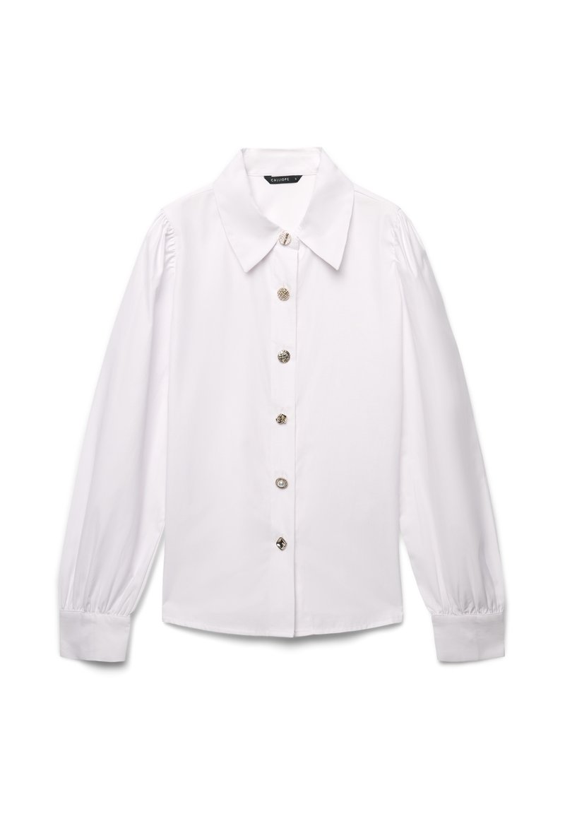 Camicia bianca con colletto ampio, maniche lunghe a sbuffo e bottoni neri lungo la parte frontale. Realizzata in un tessuto liscio e leggero.