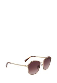 Ochelari de soare hexagonali cu ramă din metal de culoare aurie, lentile degradate de culoare maro și brațe cu model de țestoasă. Include pernuțe nazale transparente.