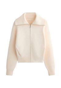 Krém színű zipzáras pulóver bordázott gallérral, lógható vállal és bordázott mandzsettával. Puha, texturált anyag két elülső zsebbel.
