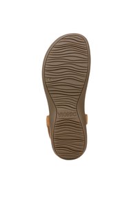Semelle de sandale en caoutchouc marron avec un motif texturé en vagues et le logo "VIONIC". Comprend un lit de pied moulé et un support de voûte plantaire pour le confort.
