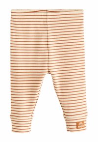 Leggings pour bébé rayés en crème et rouille, présentant une texture côtelée, une taille élastique et une étiquette cousue sur le côté inférieur.