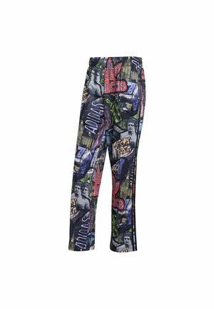 Pantalons de jogging colorés et à motifs en tissu doux. Présentent des graphismes de style graffiti, des poches et une taille élastique pour plus de confort.
