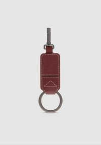 Red leather keychain with a rectangular body, textured finish, silver hardware, and a circular metal ring for attaching keys.