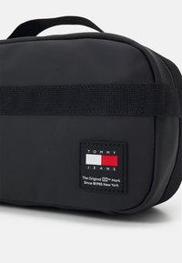 Tommy Jeans DAILY BUM UNISEX - Sac banane - black/noir - ZALANDO.FR