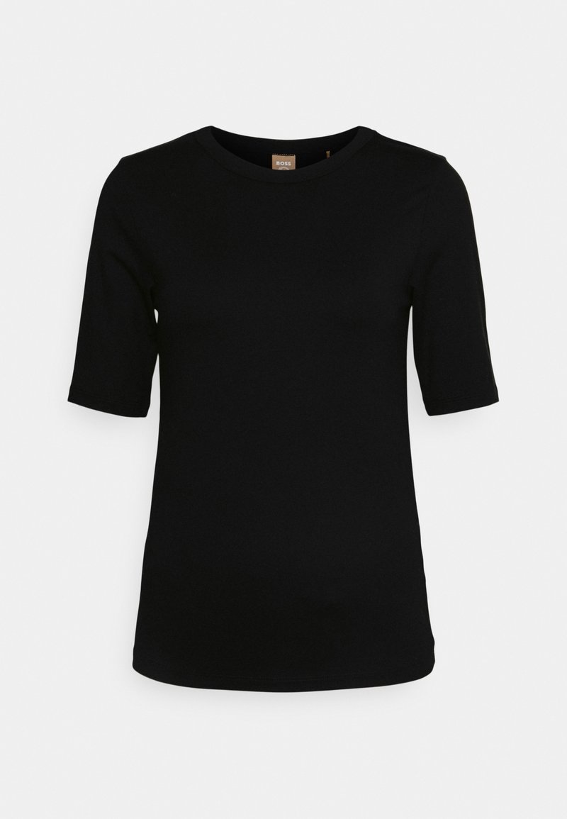 T-shirt noir cintré à manches courtes et col rond, en tissu lisse sans motifs ni logos visibles sur un fond uni.