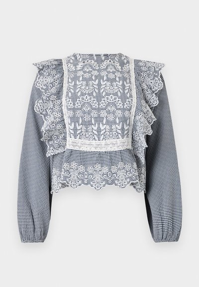 Námořnická modrá a bílá kostkovaná halenka se zdobením z krajky, volánkovými rukávy, peplum hem a elastickými manžetami, vyrobená z lehkého materiálu.