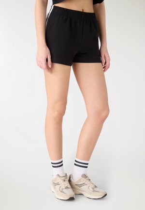 GINNICI CON BANDE LATERALI - Pantaloni sportivi - nero