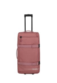 Valigia rigida color rosa con un esterno in tessuto resistente, manico telescopico, tasche con zip e cinghie di compressione per un imballaggio sicuro.
