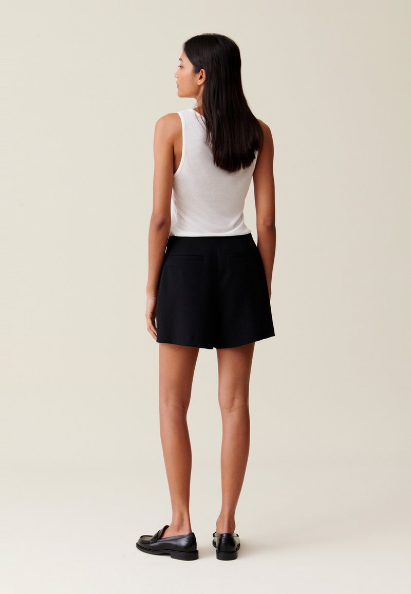 Jupe Noire Claudie Pierlot Taille 34/36 (équivalent 0) - Coton - Occasion Très Bon état