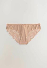 Nude-kleurige slip met een gladde voorkant, kant met een bloemperk patroon aan de achterkant, gegolfde randen en een klein strikje in het midden bij de tailleband.
