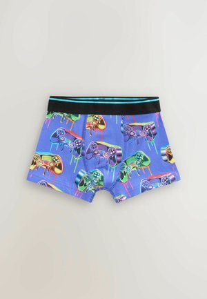 Boxer shorts in a blue fabric featuring a repeated pattern of colorful gaming controllers, with a black waistband and turquoise accent.