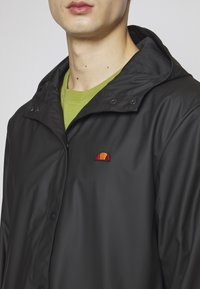 Ellesse Regnjakke / vandafvisende jakker - black