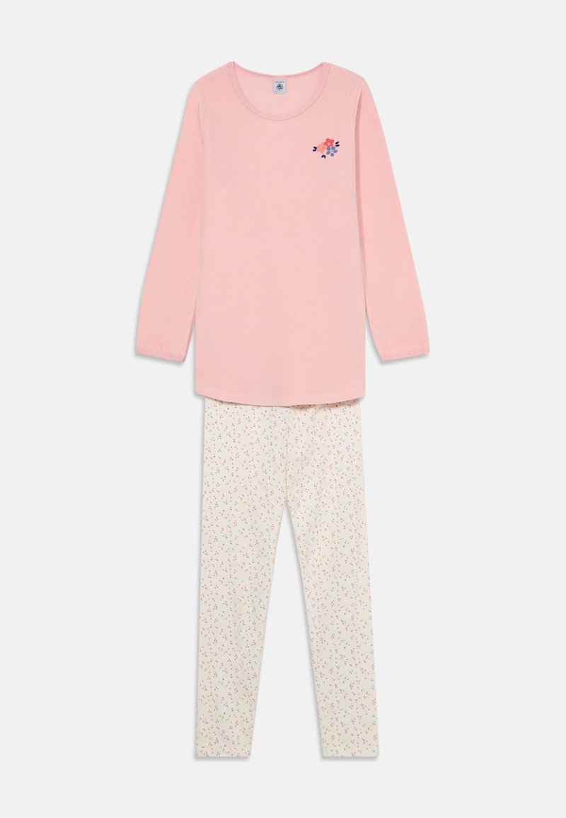 Pink long-sleeve top with floral embroidery paired with cream leggings featuring a multicolored flower pattern throughout.