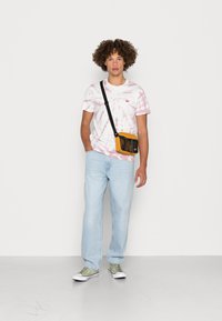 Levi's® STAY BAGGY TAPER - Calças de ganga de corte relaxado - lite euphoria