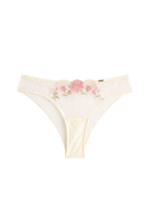 Kremfarvet kvindelig bikini-undertøj med gennemsigtigt stof med polkaprikker og lyserød rosebroderi ved den forreste linning.