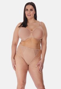 Set di reggiseno nudo e culotte a vita alta realizzato in tessuto trasparente e testurizzato, con dettagli in pizzo floreale e una finitura liscia.
