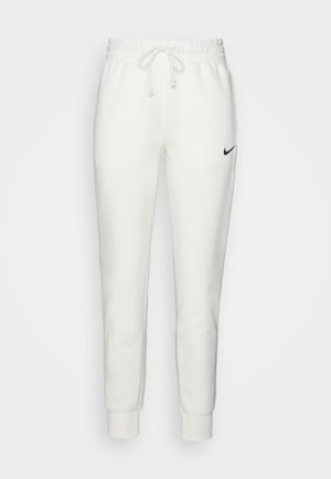 Pantalones de chándal blancos de algodón con una cinturilla elástica, cordón ajustable y logo negro de Nike en el lado izquierdo. Puños ajustados en los tobillos.