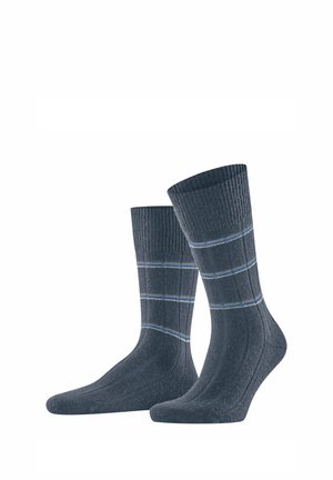 Dunkelblaue gerippte Socken mit horizontal verlaufenden blauen und hellgrauen Streifen. Weiche Textur, mittellange Höhe bis zur Wade, verstärkter Fersen- und Zehenbereich.