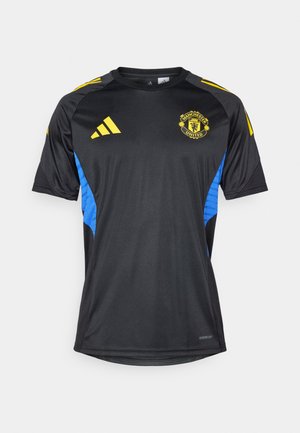adidas Performance MANCHESTER UNITED 25/26 EUROPEAN TRAINING JERSEY - Športové tričko - black/blue/tribe yellow