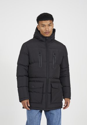 Black padded jacket with a hood, featuring zippered chest pockets and large front pockets, textured fabric, and a straight cut design.