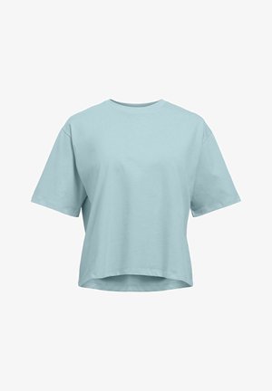 T-shirt ample à manches courtes bleu clair avec un col rond et un ourlet légèrement incurvé.