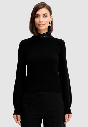 LUPETTO IN  - Maglione - nero