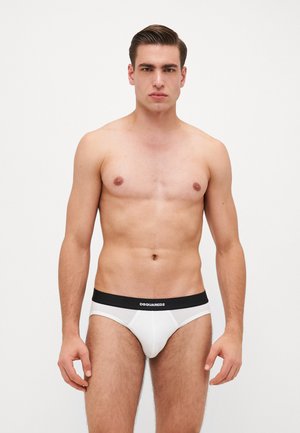 Weiße Slips mit einem schwarzen elastischen Taillenbund, der mit "DSQUARED2" Branding versehen ist. Glattes Material, figurbetonte Passform und klassisches Design für hohen Tragekomfort.