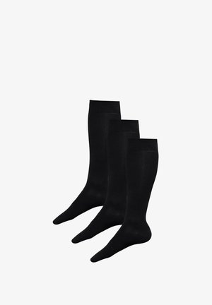 Calze nere al ginocchio in tessuto liscio ed elastico. Set di tre, con polsino a costine e punta rinforzata per una maggiore durata.