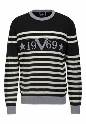 Pull rayé noir et blanc avec col et poignets gris, affichant "19V69" et des étoiles grises sur la poitrine.
