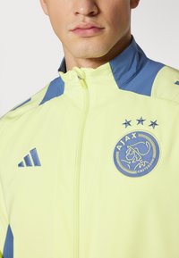 adidas Performance AJAX AMSTERDAM PRESENTATION JACKET - Træningsjakke - pulse yellow