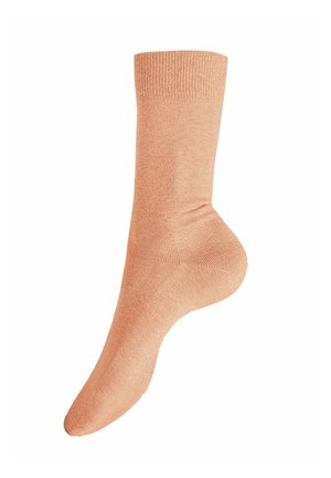 Ein einzelner beiger Knöchelsocken mit geripptem Bündchen, glatter Textur und verstärkter Ferse vor weißem Hintergrund.