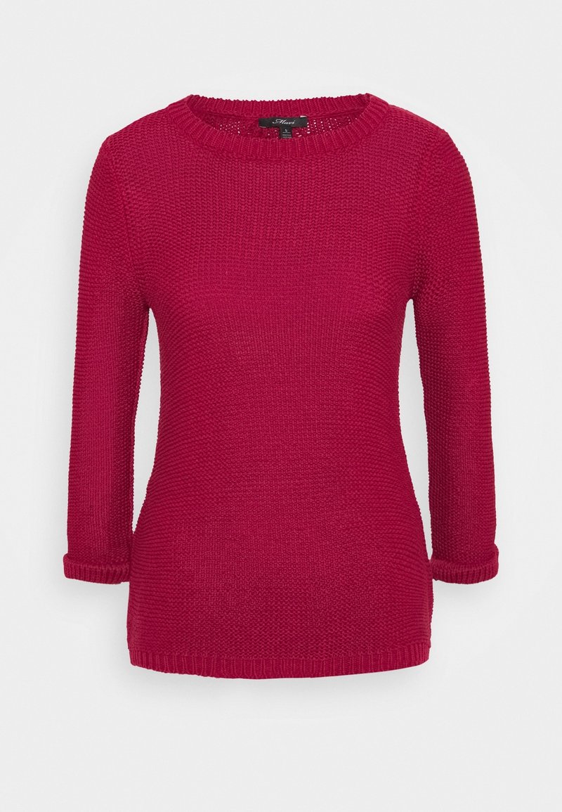 Pletený pulovr v jasně červené barvě, s kulatým výstřihem, tříčtvrtečními rukávy a žebrovanými manžetami. Celý z texturované látky.