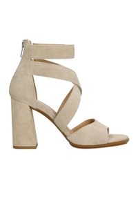 Beige Wildleder-Sandaletten mit Blockabsatz, offenem Zehenbereich und gekreuzten Knöchelriemen. Mit einem Reißverschluss hinten für ein einfaches An- und Ausziehen.