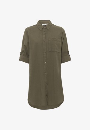 Oliivinvihreä pitkä paitapusero, jossa napillinen etupuoli, rintatasku, käännetyt hihat nappikiinnityksillä ja kaareva helma.