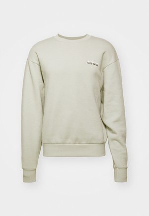 Hele hall sweatshirt, mis on valmistatud puuvillasegust, ümmarguse kaelusega, pikkade varrukatega, soonikuga mansettide ja väikese tikandiga disainiga rinnal.