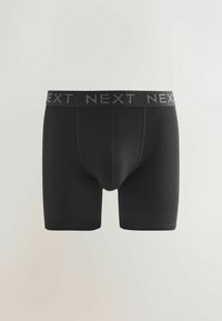 Black men's boxer briefs with a wide elastic waistband featuring the repeated brand name "NEXT" in gray lettering.