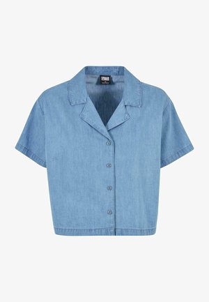 Heled sinine denimist nööbipluus, millel on krae, lühikesed varrukad ja lühendatud disain, nähtava õmblusega ning kuue esisonga või nööbiga.