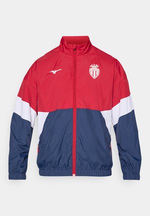 Červená, námořní a biela windbreaker bunda. Obsahuje plný zips, vysoký golier, elastické manžety a vyšívané logo na hrudi. Ľahký materiál.
