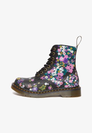 Black leather ankle boots with a floral print in purple, pink, and green accents. Features gold-tone eyelets and a textured sole.