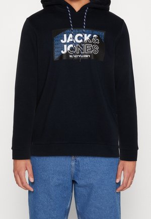 Sudadera de marina con cordón, que presenta un gran diseño de logo en negro y azul. Material suave, puños acanalados y un corte relajado.